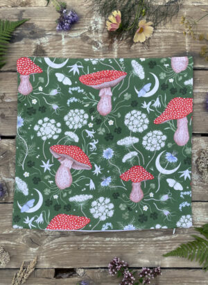 magick mushroom forest green cotton cushion