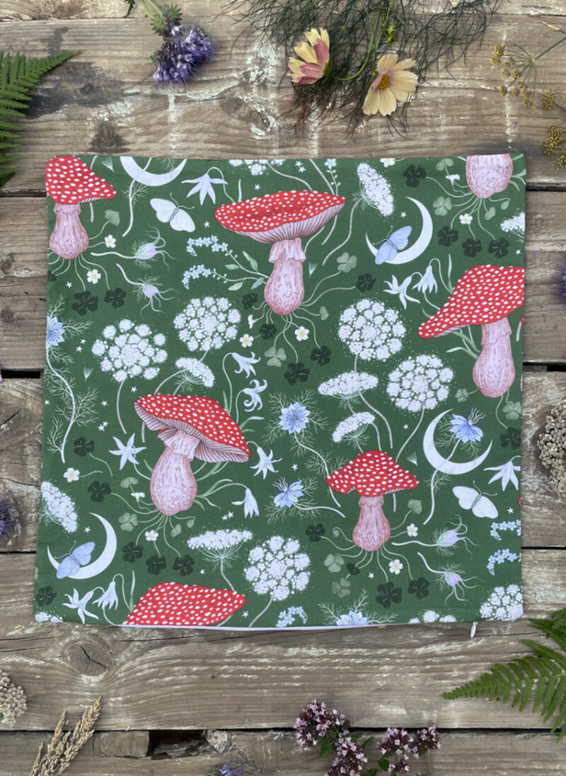 magick mushroom forest green cotton cushion